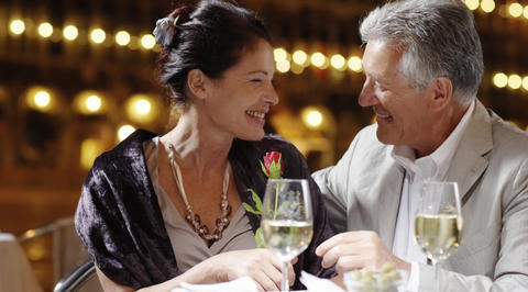 Man and woman drinking white wine together