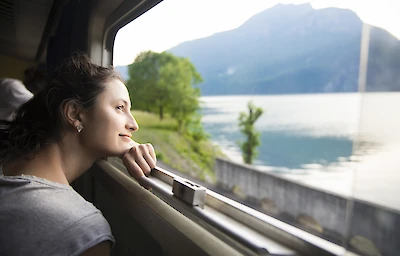 Main image linking to post titles: These Pacific Northwest Train Trips Have Waterfalls, Mountains, and Boutique Hotels Worth the Detour