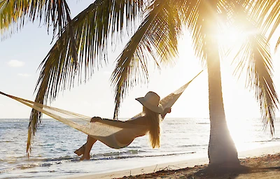 Main image linking to post titles: The Warm-Weather Getaways We’re Dreaming About Now