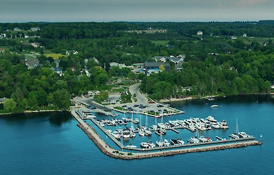 Main image linking to post titles: How Mail Delivery By Boat Has Made A Splash In Lake Geneva, Wisconsin